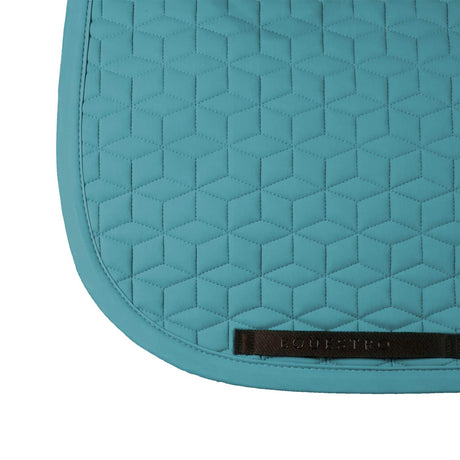 Dressage saddle pad with cube quilting